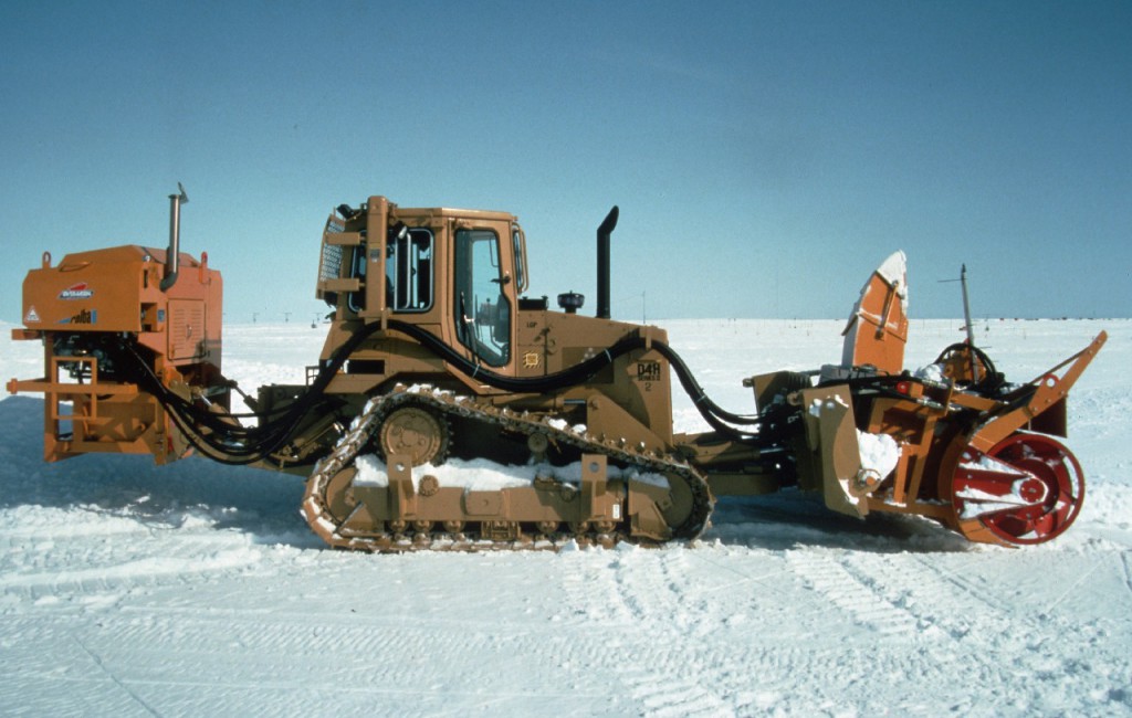 Caterpillar D4 complete with snow blowing equipment