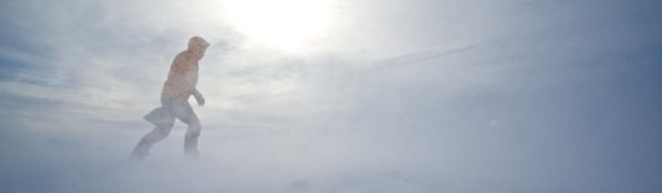 A man walking in a stormy weather