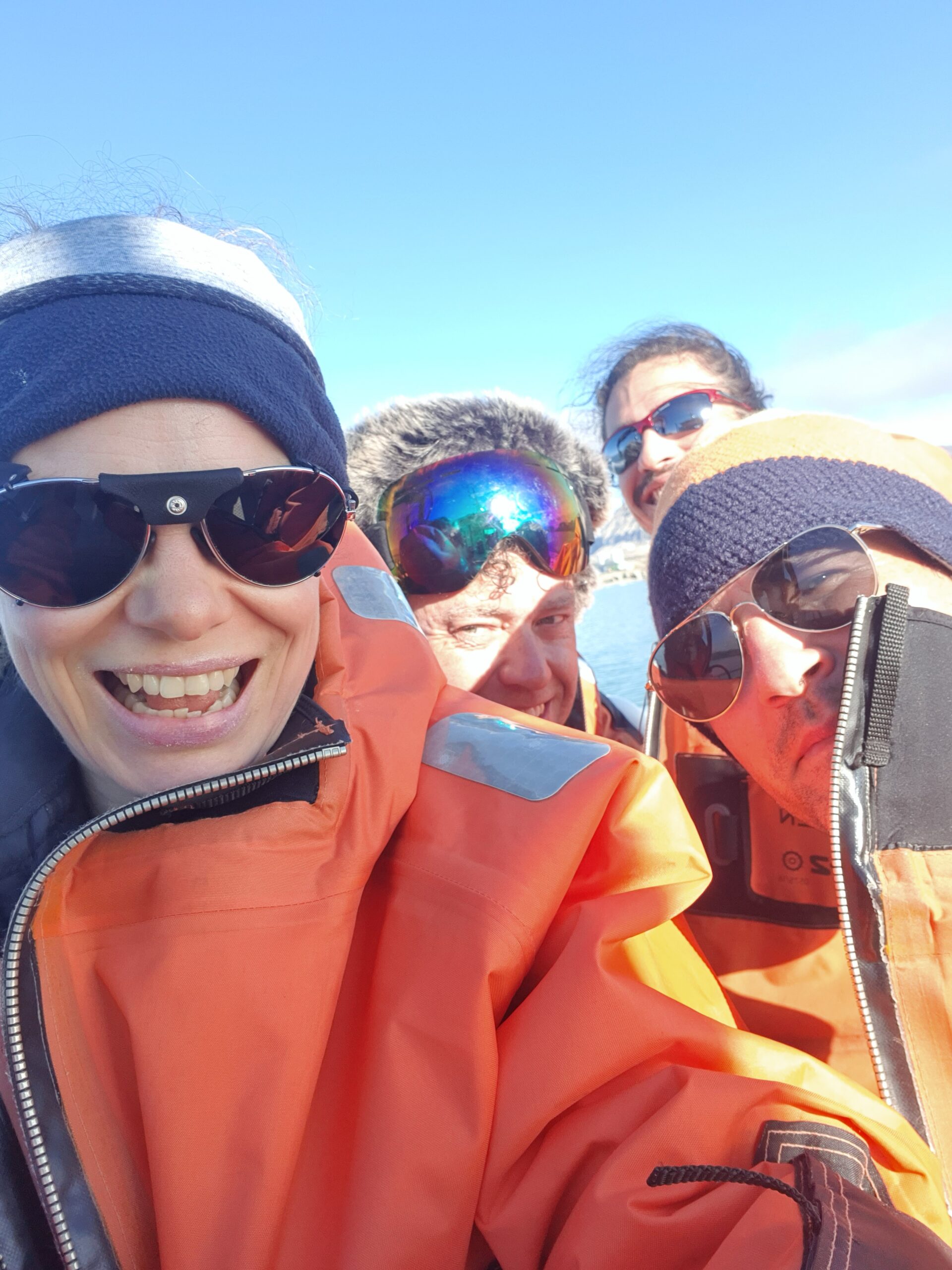 A group of people wearing sunglasses