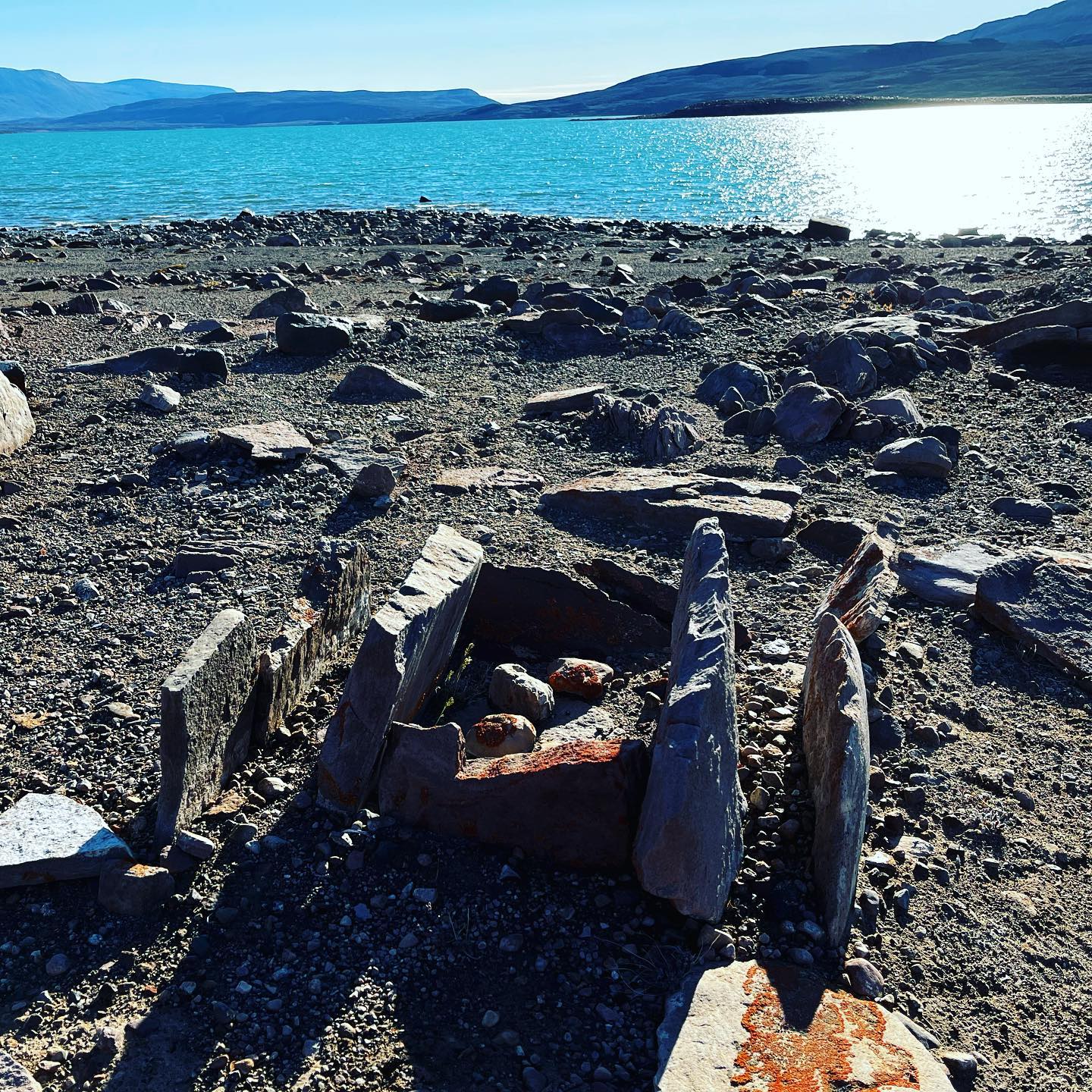 A rocky beach next to the ocean