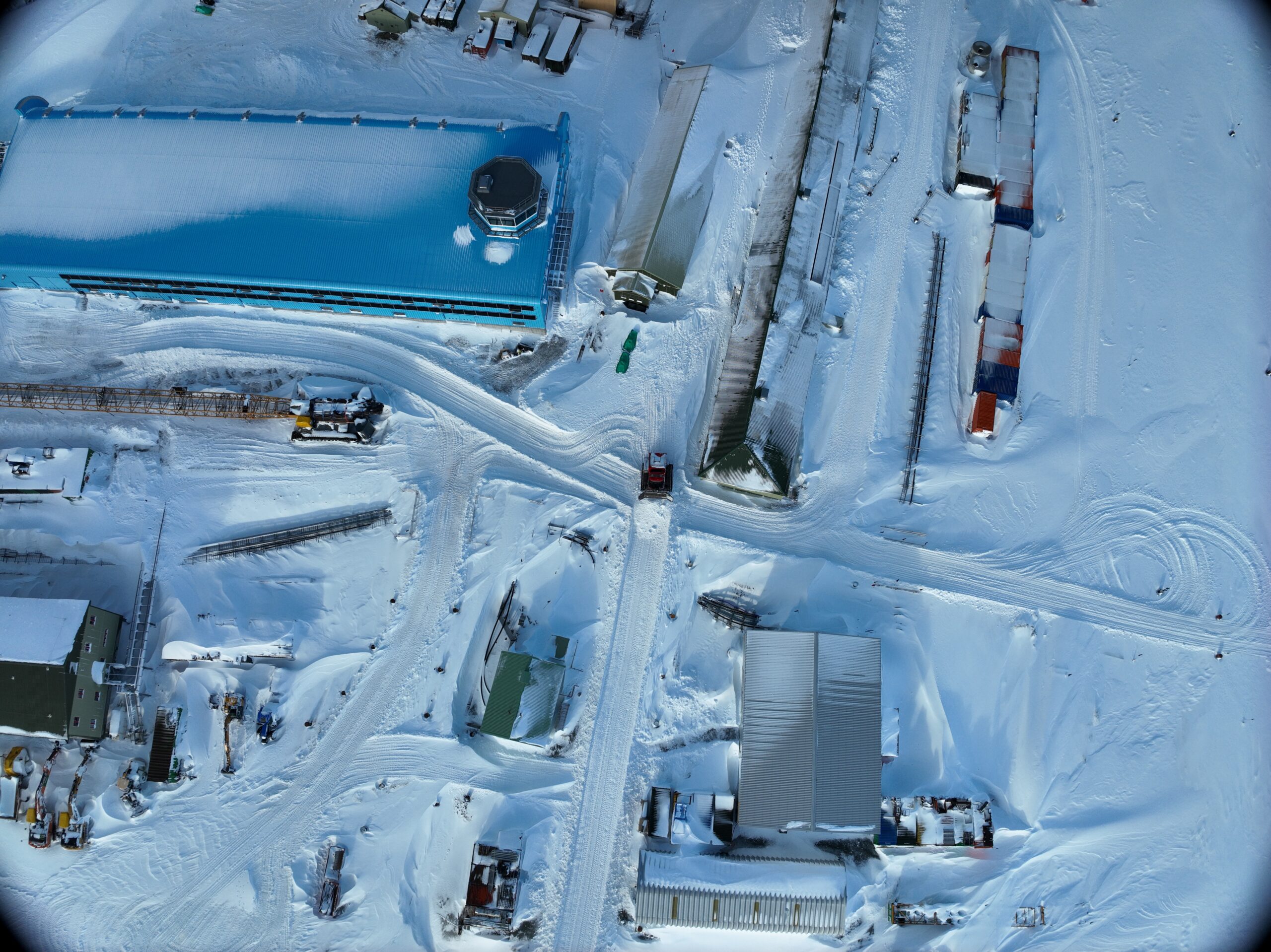 Aerial view of lots of bulidings covered in snow