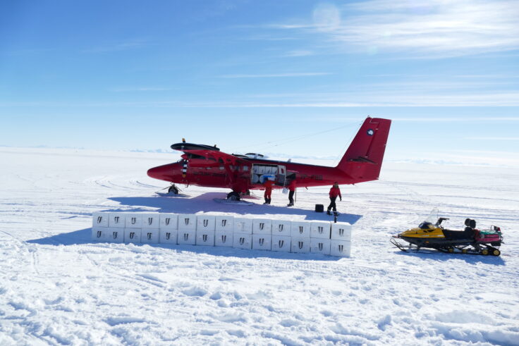 A airplane that is covered in snow