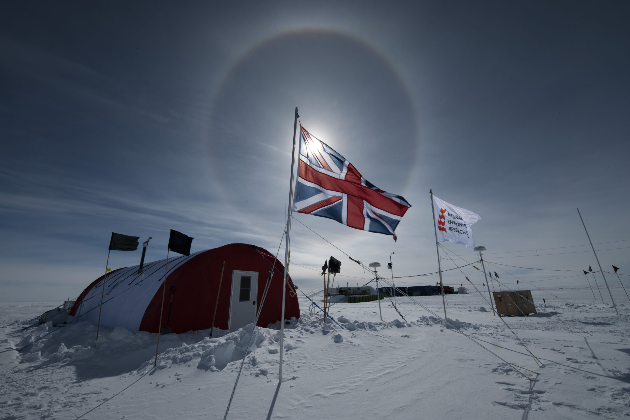 A field camp with a Union Jack flying